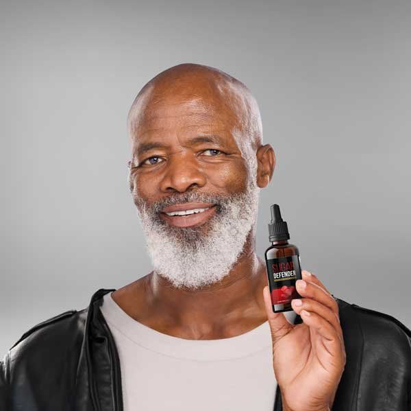 Customer holding Sugar Defender supplement with testimonial about blood sugar improvement