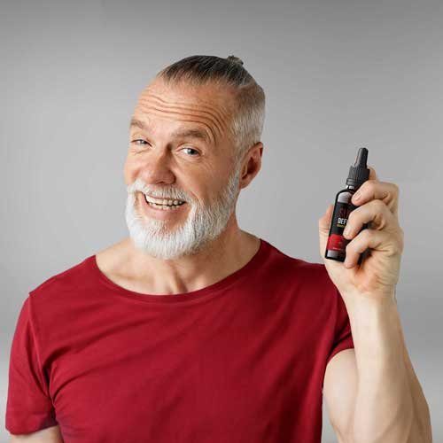 Man holding Sugar Defender supplement sharing positive results for blood sugar support